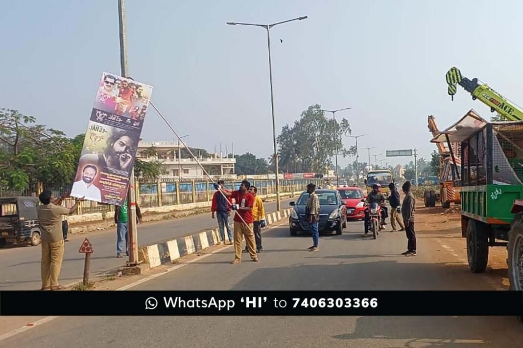 hidlaghatta Municipality staff removing illegal banners and flex boards across the city