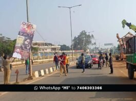 hidlaghatta Municipality staff removing illegal banners and flex boards across the city