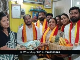 KRV Simha Sene activists honoring CMC G. Amrutha with a silk saree and traditional plate