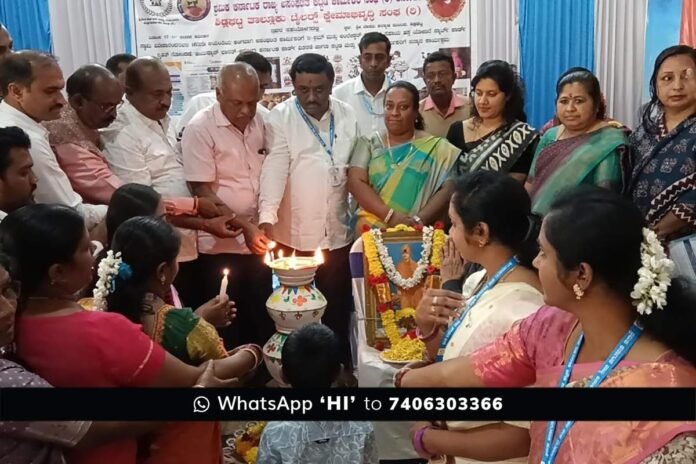 CMC Commissioner Amrutha and BJP leader Ramachandra Gowda distributing health cards to workers