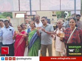 Sidlaghatta Pyramid Spiritual Society members outside theatre after film release