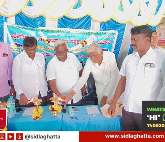 Lamp lighting ceremony at Appegowdanahalli Milk Producers Cooperative Society annual general meeting, Sidlaghatta taluk