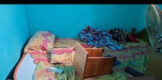 Ransacked bedroom with broken cupboard drawer after a daylight house burglary in Bodagooru village, Sidlaghatta taluk