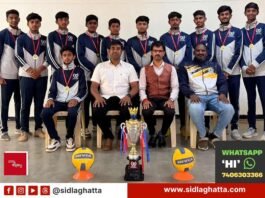 Dolphins PU College volleyball team district champions with trophy and medals, Sidlaghatta