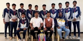Dolphins PU College volleyball team district champions with trophy and medals, Sidlaghatta