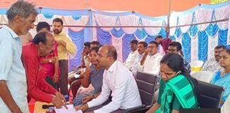 Officials receiving public applications at Prajaseva Andolana in Jangamakote hobli, Sidlaghatta