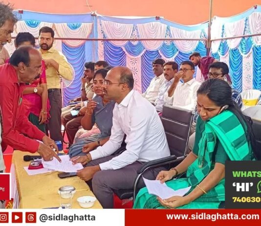 Officials receiving public applications at Prajaseva Andolana in Jangamakote hobli, Sidlaghatta