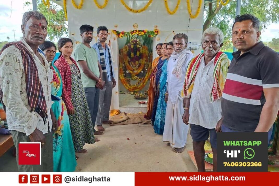 Devotees gathered around the newly consecrated Sri Muneshwara Swamy idol at Gummanahalli, Sidlaghatta taluk