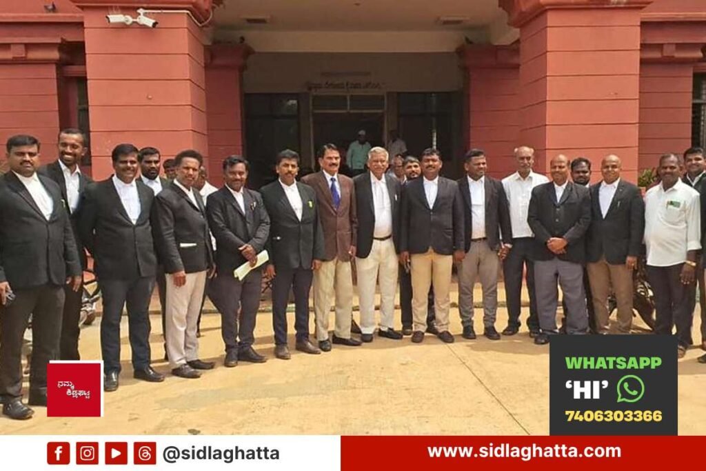 Sidlaghatta advocates gathered outside the court during the court boycott protest