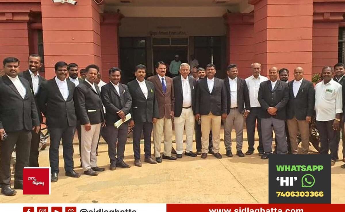 Sidlaghatta advocates gathered outside the court during the court boycott protest